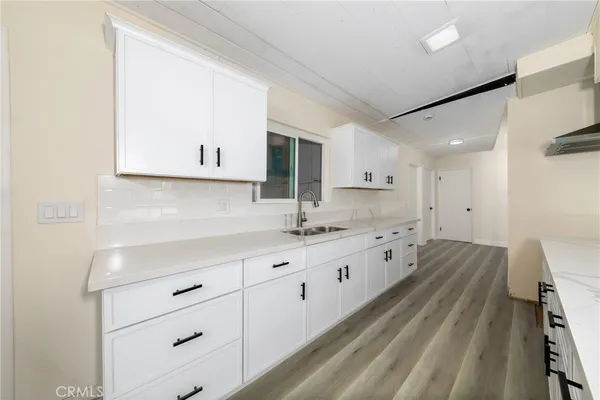 a view of living room with granite countertop furniture and fireplace