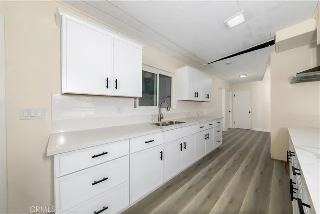 a view of living room with granite countertop furniture and fireplace