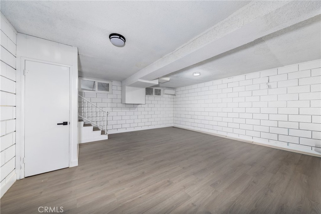 12449 6th Street Yucaipa, CA 92399 - Photo 18 of 37 wooden floor in an empty room