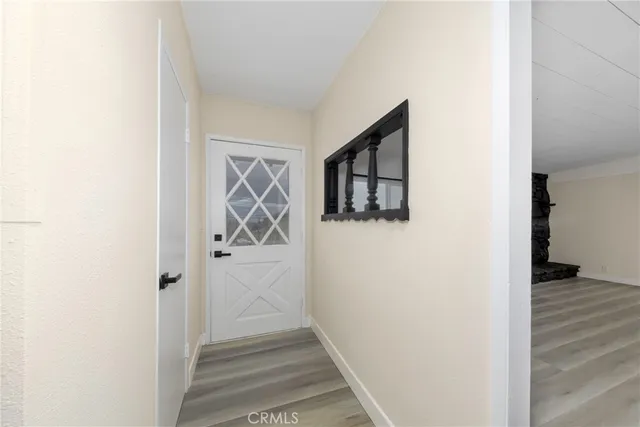 a view of a room with a large window