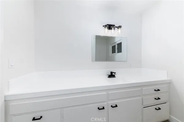 a bathroom with a toilet and a bathtub