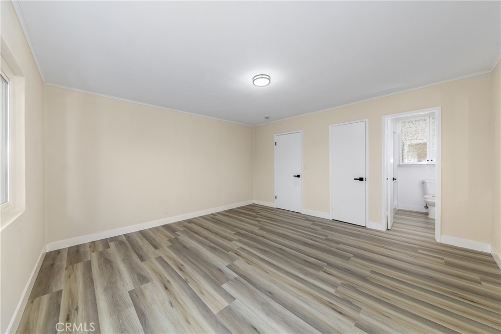 12449 6th Street Yucaipa, CA 92399 - Photo 34 of 37 wooden floor in an empty room