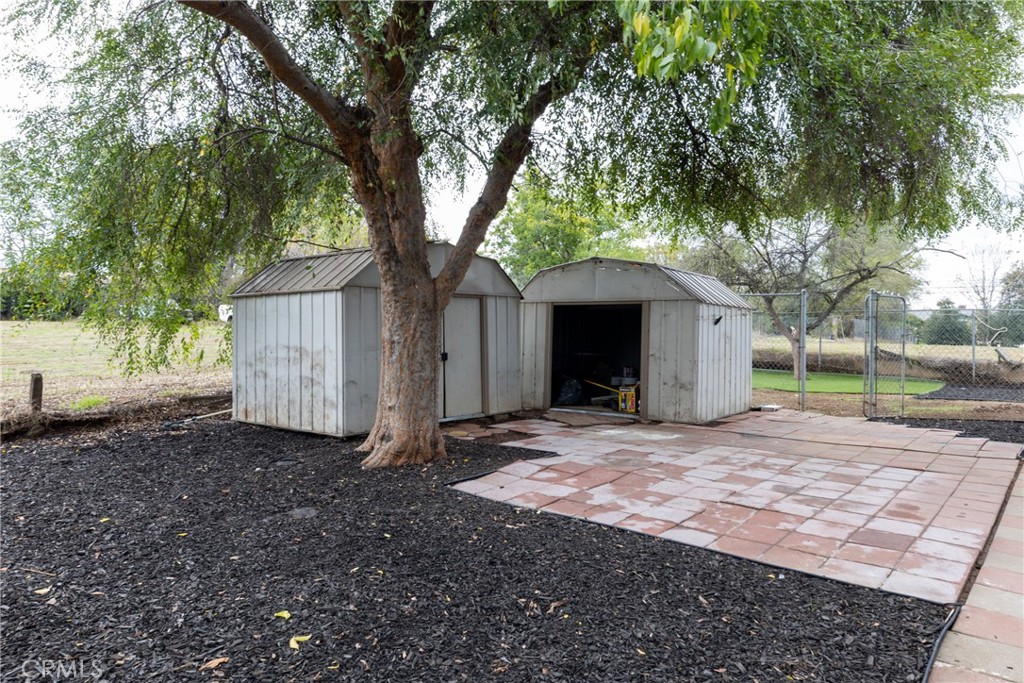 12449 6th Street Yucaipa, CA 92399 - Photo 37 of 37 a house with trees in front of it