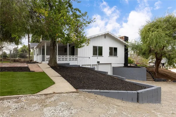 a view of backyard with green space
