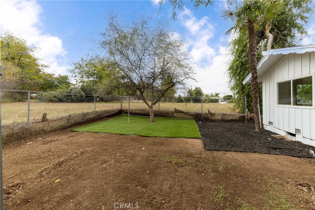 12449 6th Street Yucaipa, CA 92399 - Photo 7 of 37 a view of backyard with green space