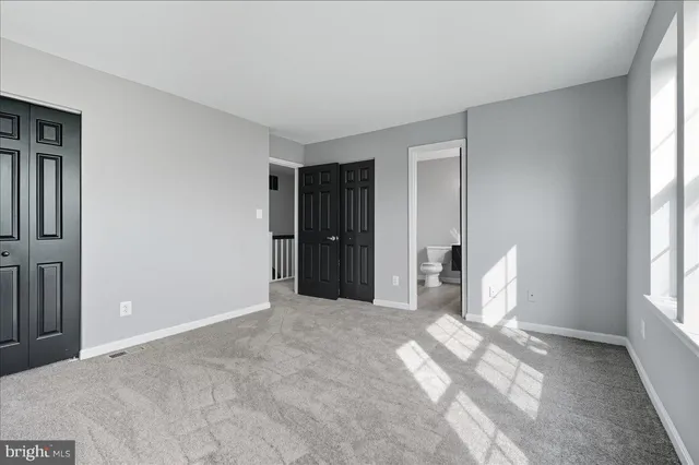 a view of livingroom with furniture and window