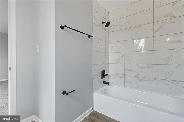 a bathroom with a bathtub