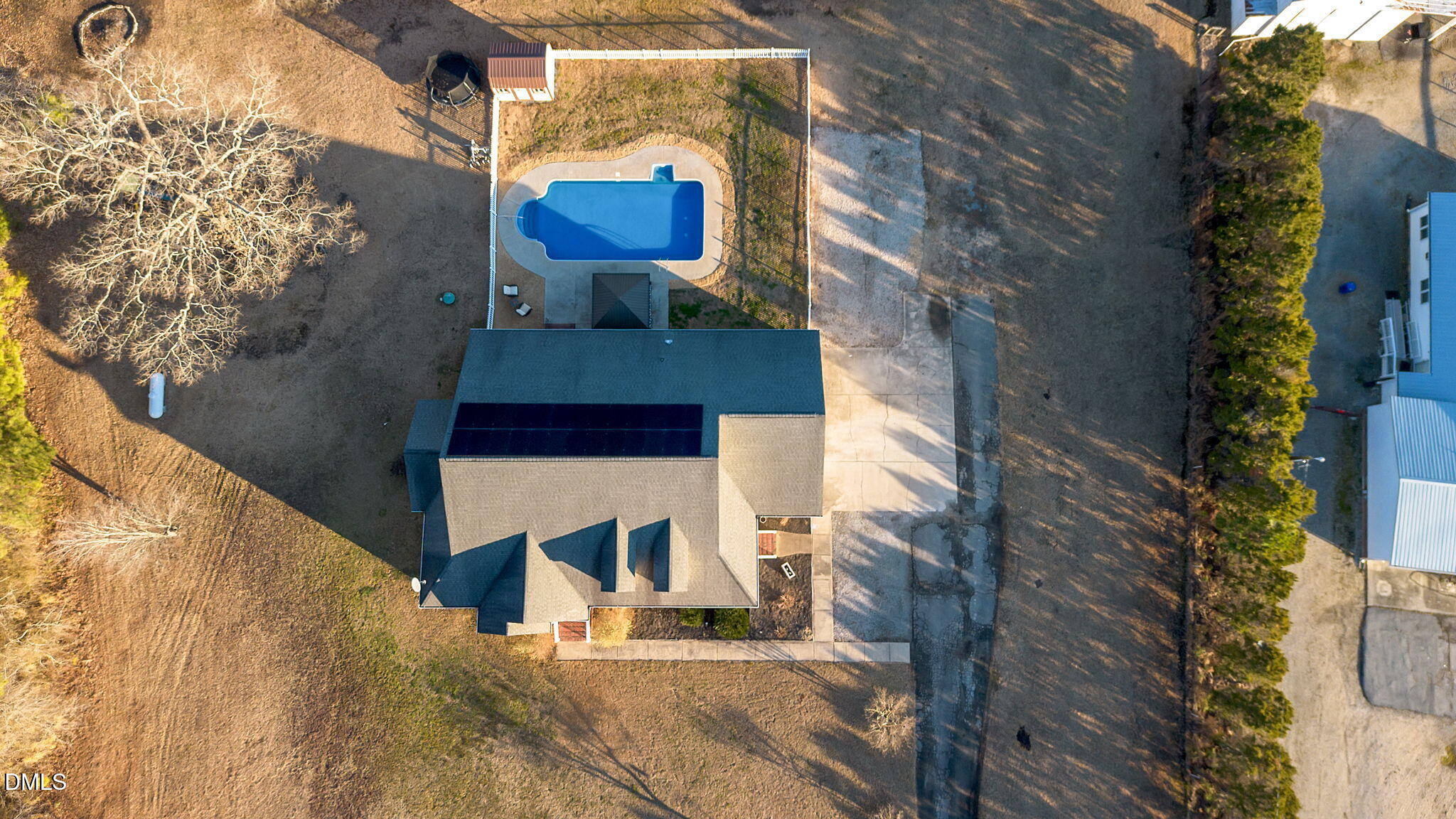 1869 Firetower Road Selma, NC 27576 - Photo 1 of 67 a view of a house with a small yard and wooden fence