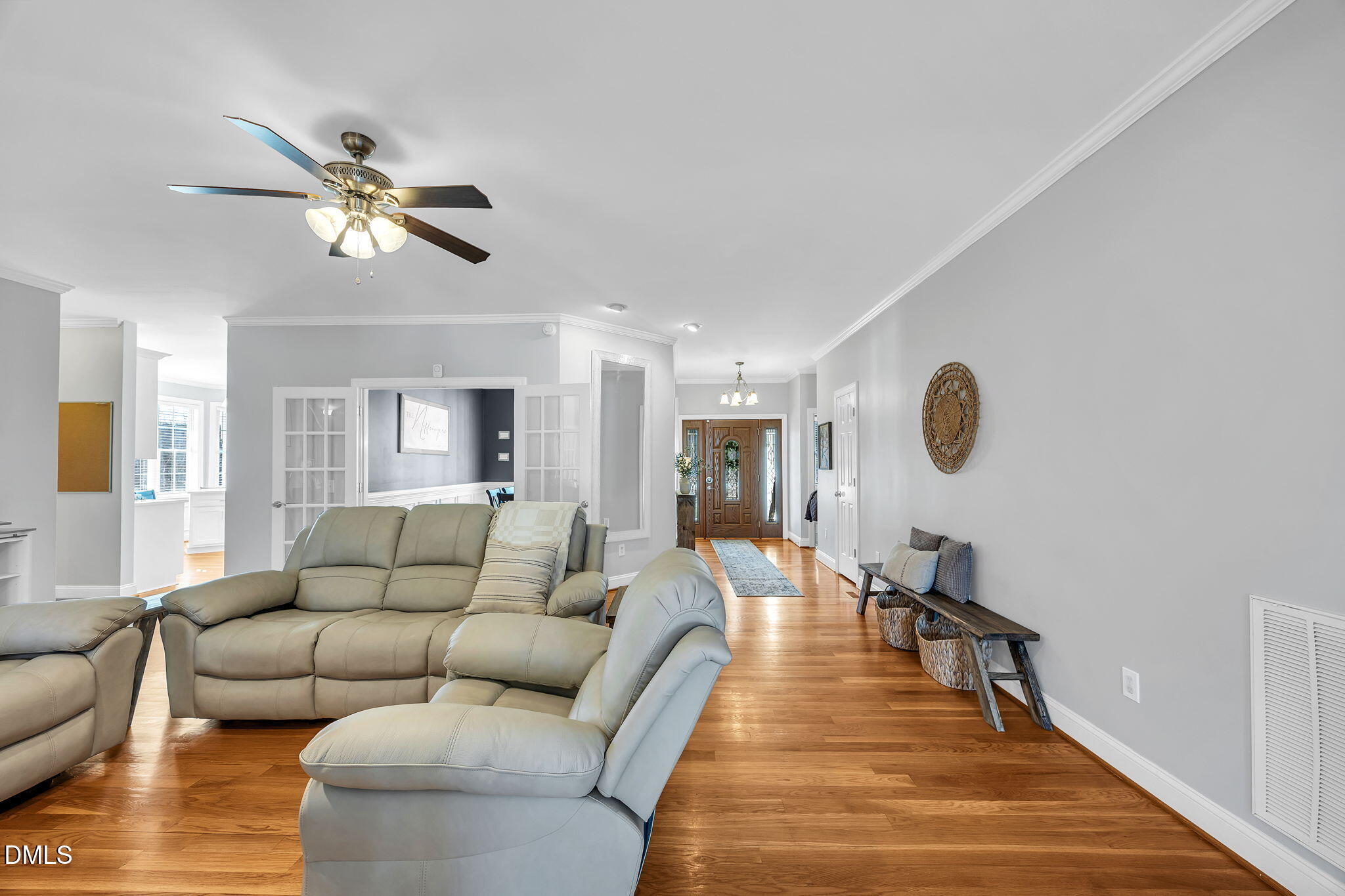 1869 Firetower Road Selma, NC 27576 - Photo 20 of 67 a living room with furniture and a wooden floor