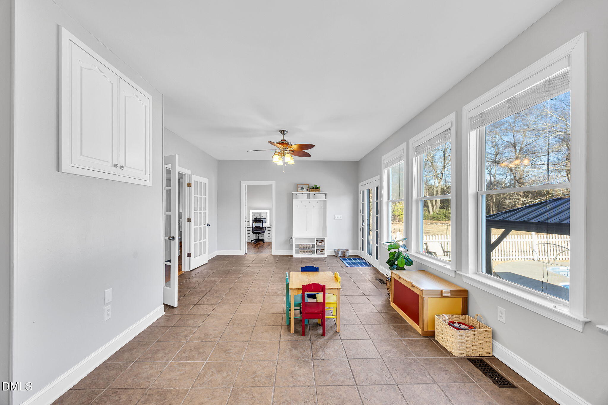 1869 Firetower Road Selma, NC 27576 - Photo 35 of 67 a living room with furniture and a potted plant