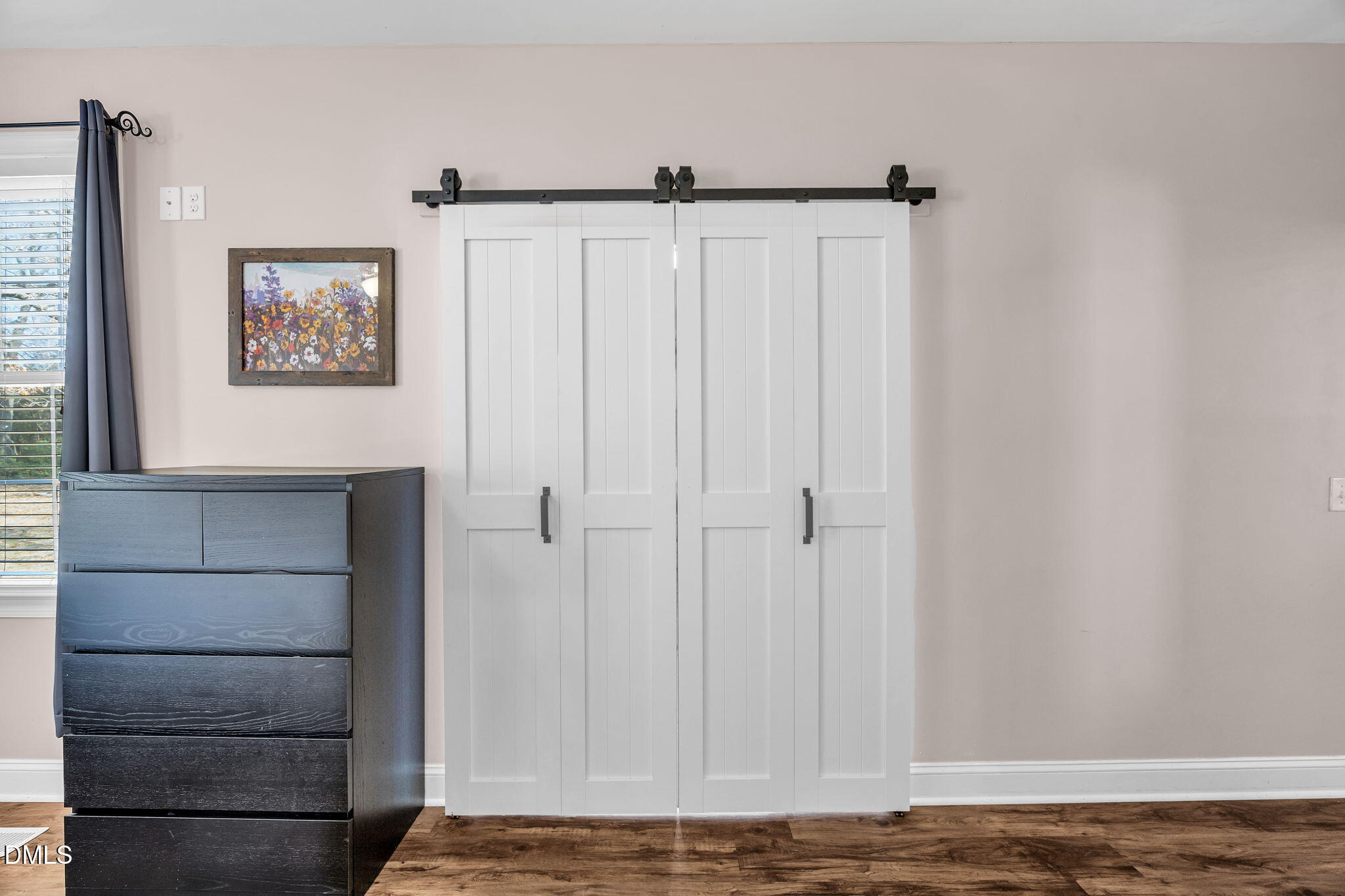 1869 Firetower Road Selma, NC 27576 - Photo 39 of 67 a view of a hallway with wooden floor and a cabinet