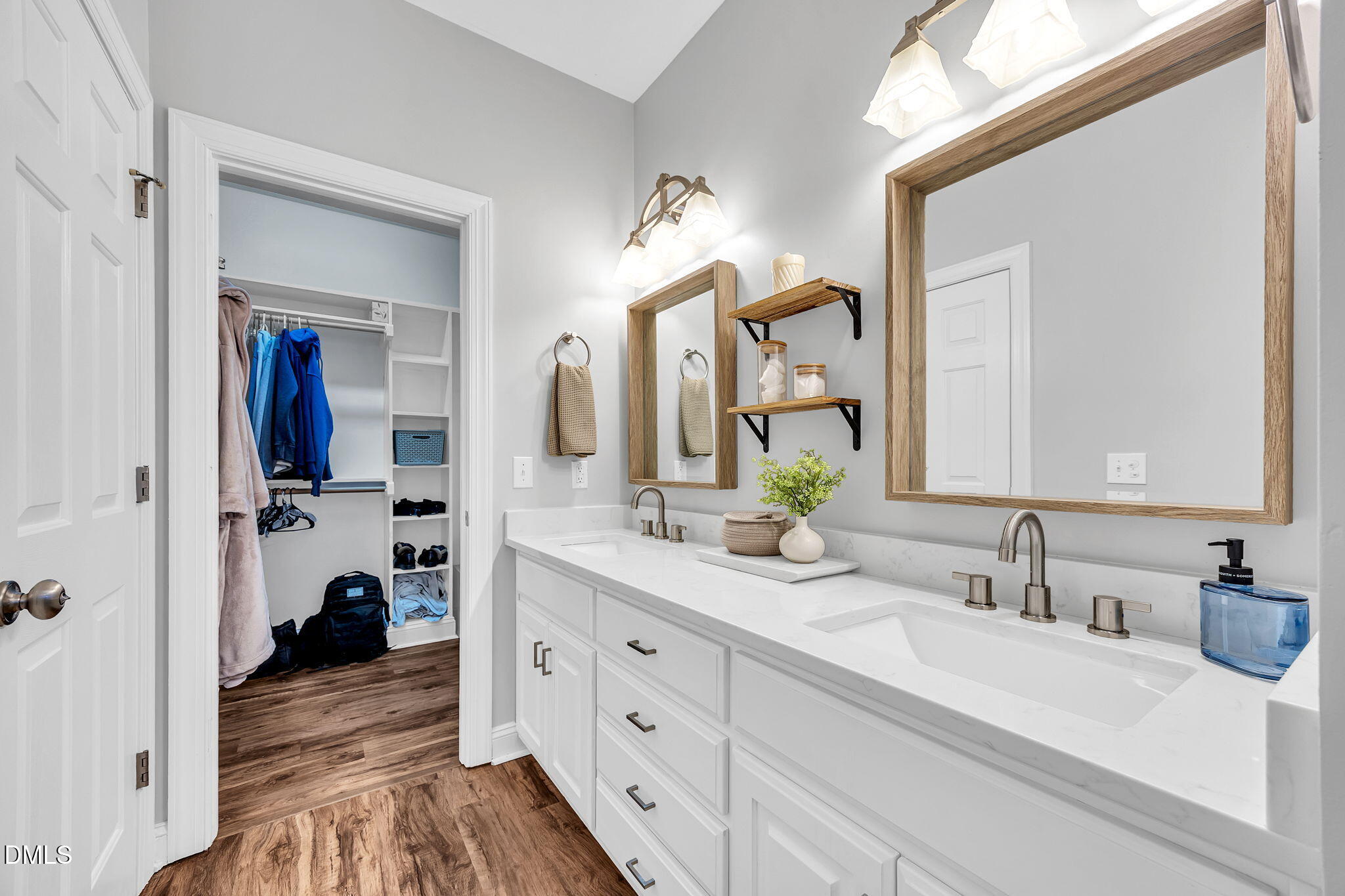 1869 Firetower Road Selma, NC 27576 - Photo 44 of 67 a en suite bathroom with a granite countertop sink and a mirror