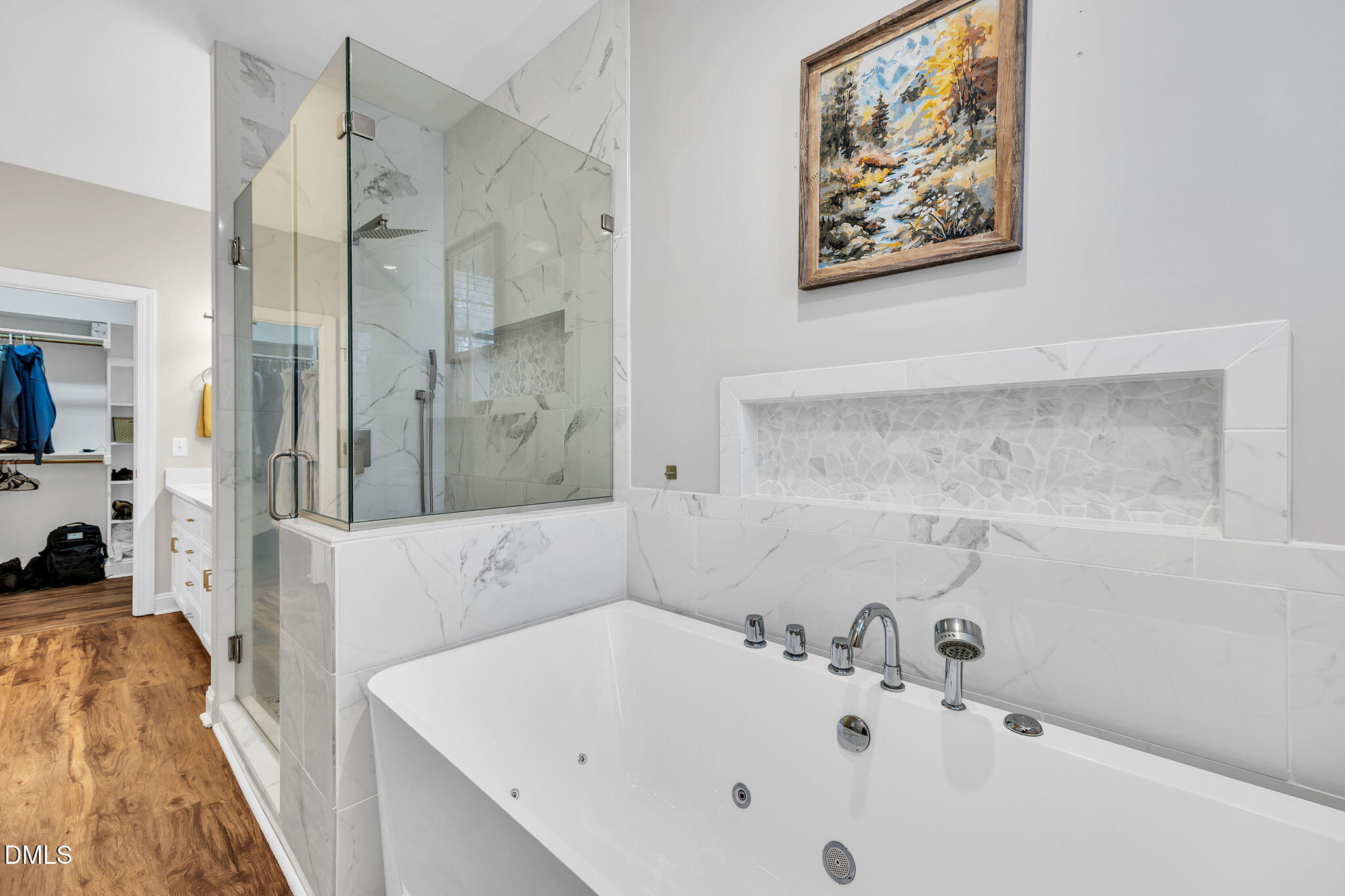 1869 Firetower Road Selma, NC 27576 - Photo 45 of 67 a bathroom with a tub sink and glass door