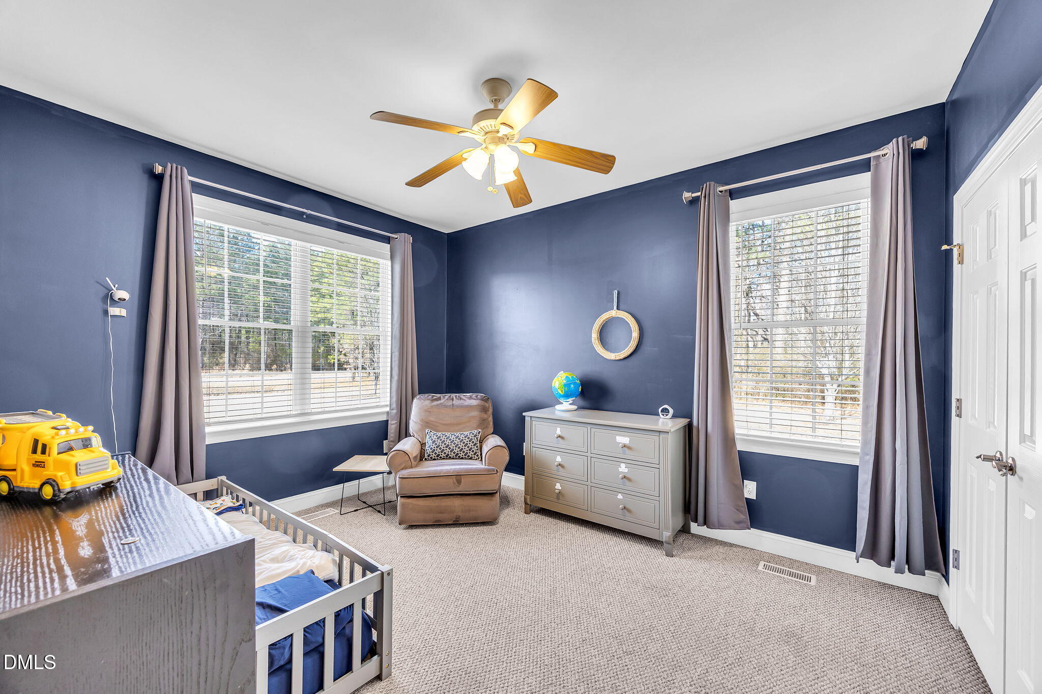 1869 Firetower Road Selma, NC 27576 - Photo 49 of 67 a living room with furniture and a window