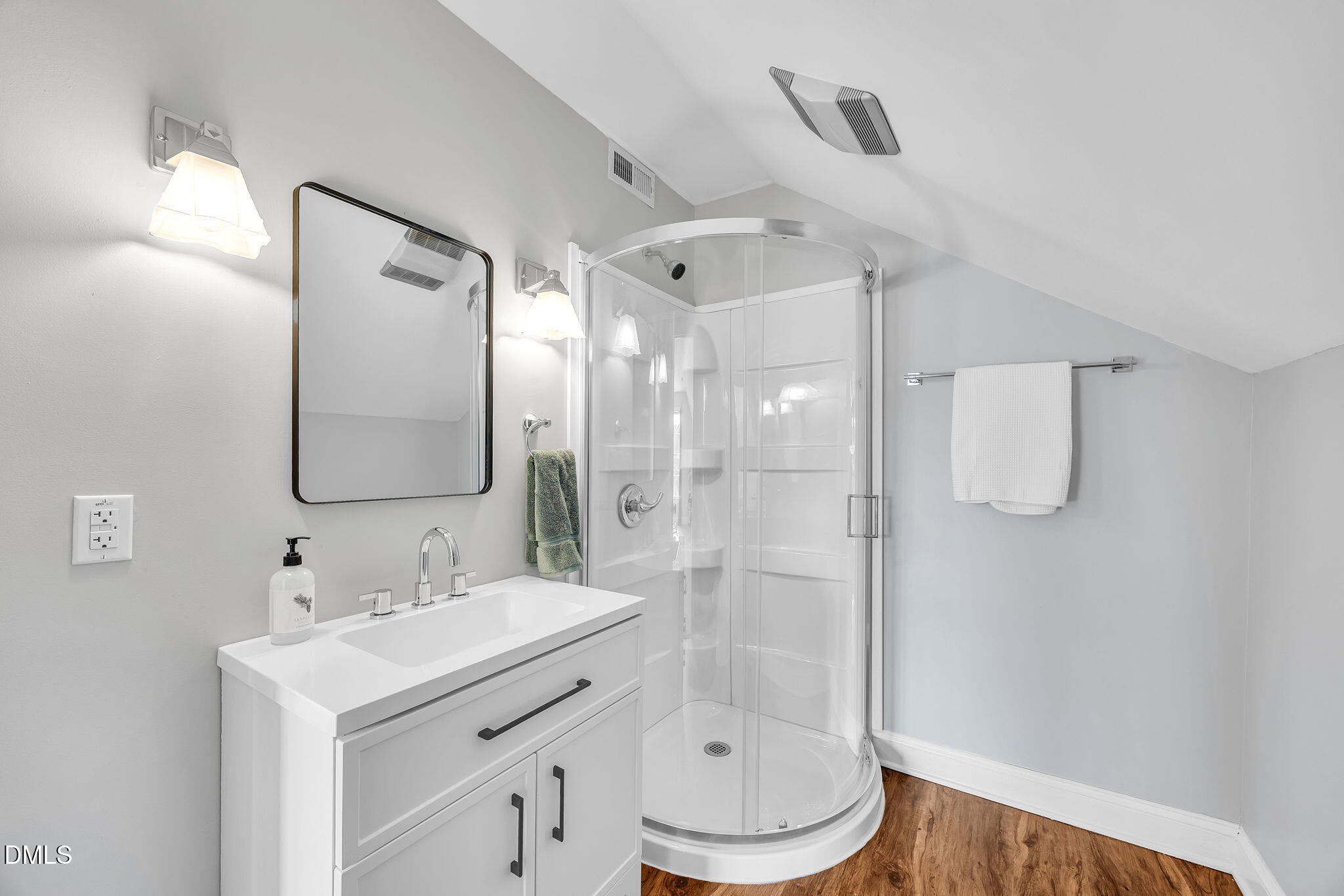 1869 Firetower Road Selma, NC 27576 - Photo 56 of 67 a bathroom with a sink toilet and shower