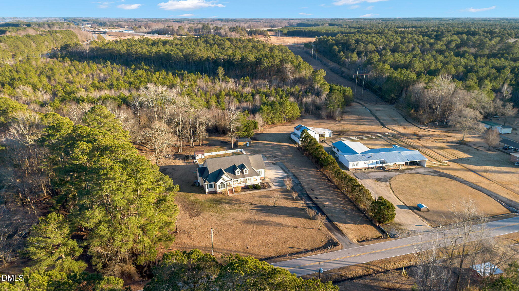 1869 Firetower Road Selma, NC 27576 - Photo 59 of 67 an aerial view of a house with a lake view