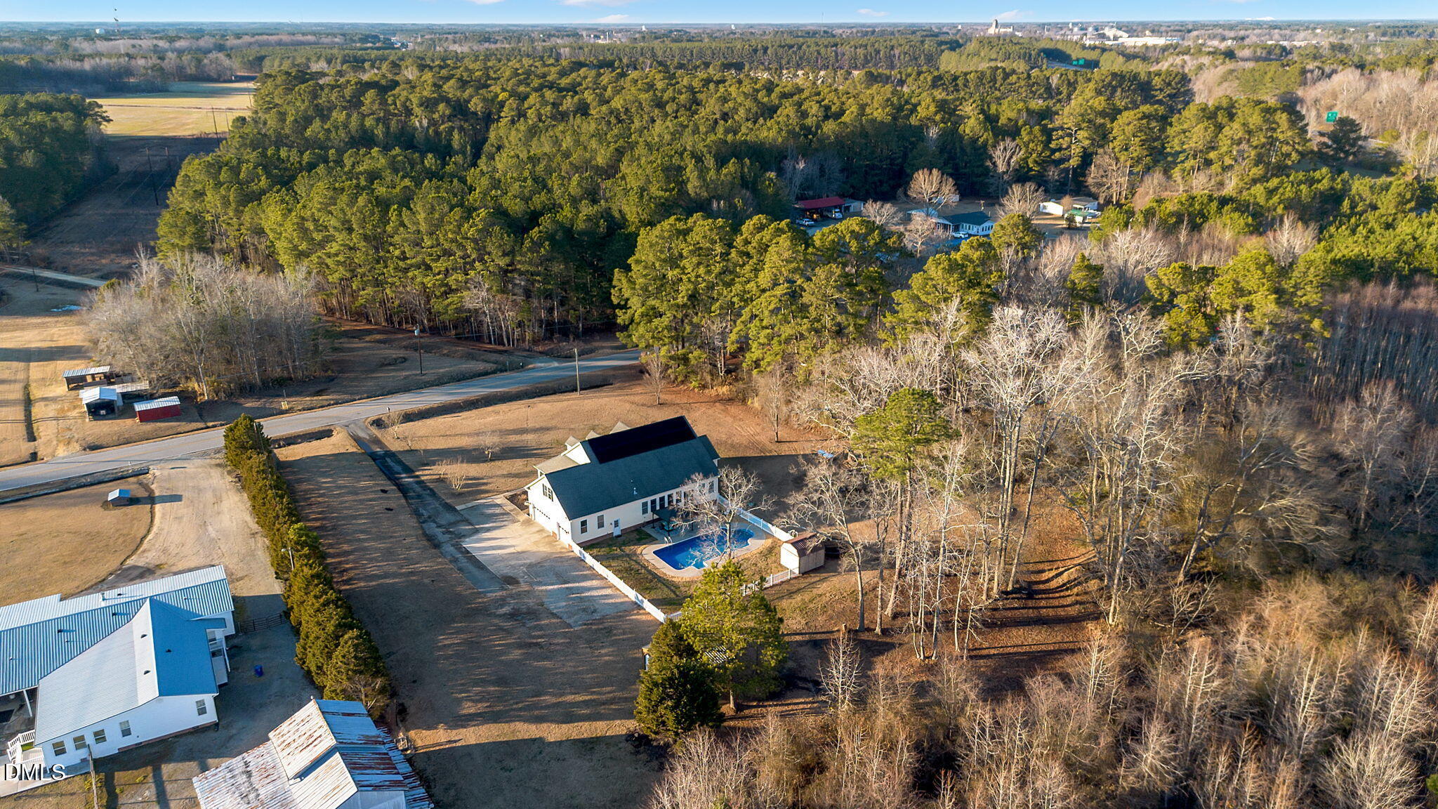 1869 Firetower Road Selma, NC 27576 - Photo 60 of 67 a view of a yard with an outdoor seating