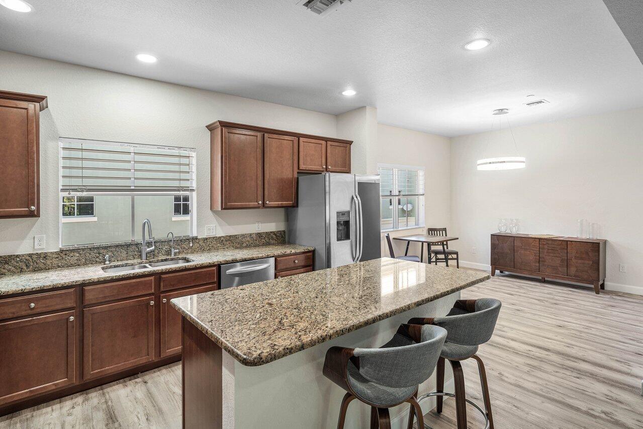 48 Northwest Hawthorne Place Boca Raton, FL 33432 - Photo 13 of 35 Kitchen and Dining Area