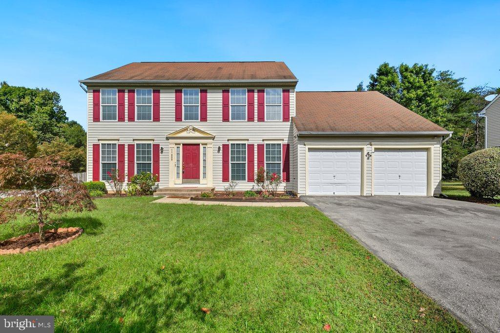 11000 Snowden Pond Road Laurel, MD 20708 - Photo 1 of 1 a front view of a house with yard and green space