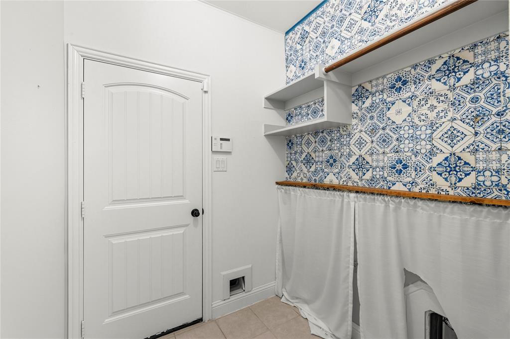 1102 Brigham Drive Forney, TX 75126 - Photo 8 of 30 Laundry room featuring light tile patterned floors