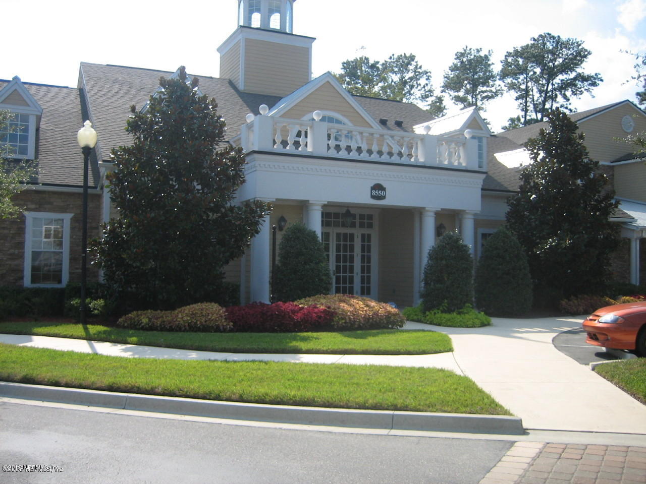 8550 Touchton Road, Unit 323 Jacksonville, FL 32216 - Photo 14 of 19 a front view of a house with garden