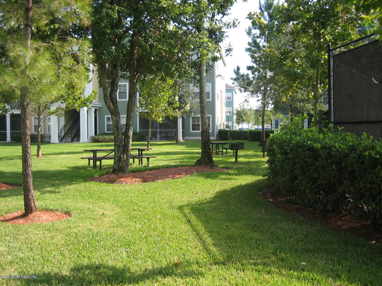 8550 Touchton Road, Unit 323 Jacksonville, FL 32216 - Photo 15 of 19 a view of a park with large trees