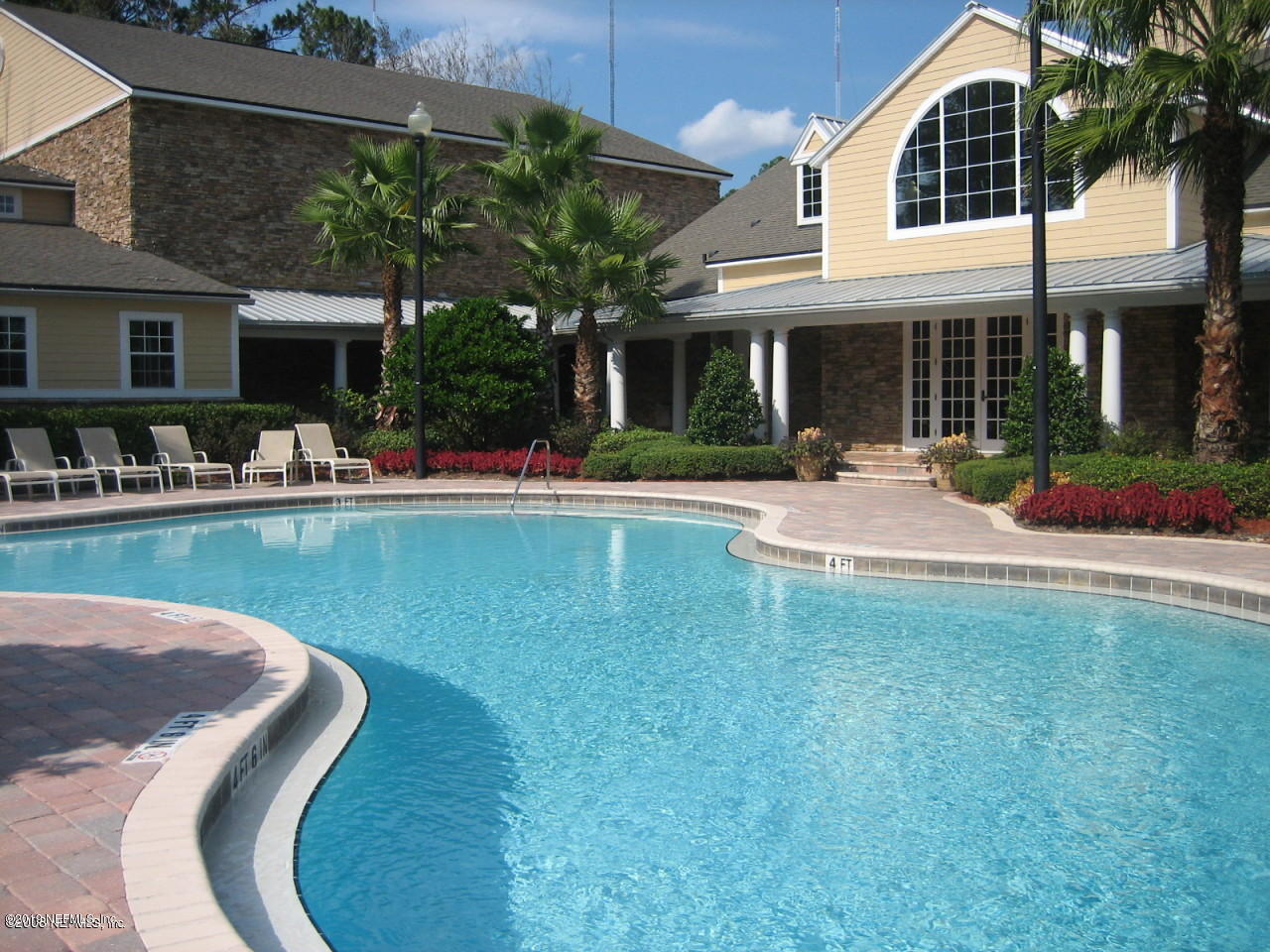 8550 Touchton Road, Unit 323 Jacksonville, FL 32216 - Photo 16 of 19 a front view of a house with swimming pool