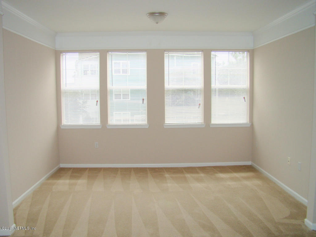 8550 Touchton Road, Unit 323 Jacksonville, FL 32216 - Photo 2 of 19 an empty room with a window