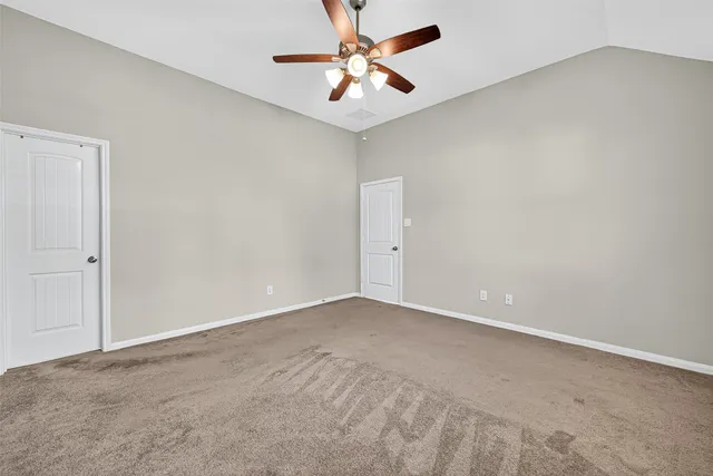 a bathroom with a sink double vanity and a mirror