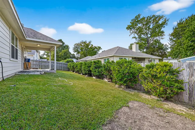 a view of a backyard with plants