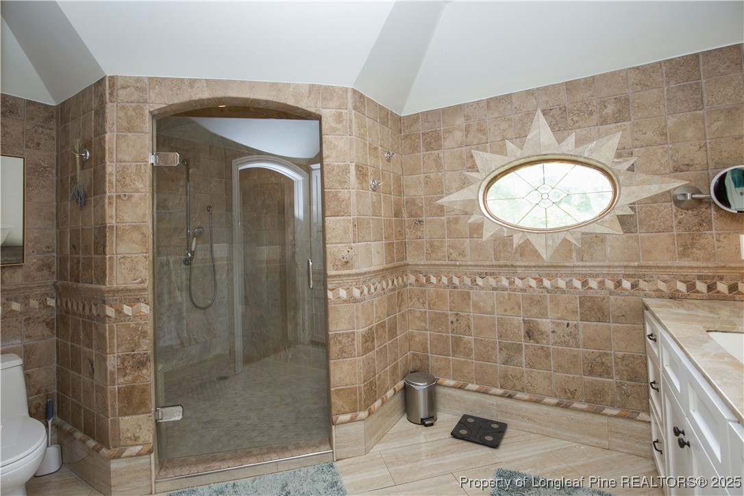 200 Cameron Avenue Vass, NC 28394 - Photo 22 of 50 a bathroom with a toilet and a shower