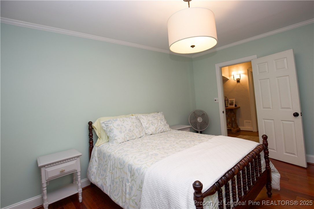 200 Cameron Avenue Vass, NC 28394 - Photo 24 of 50 a bedroom with a bed and a mirror