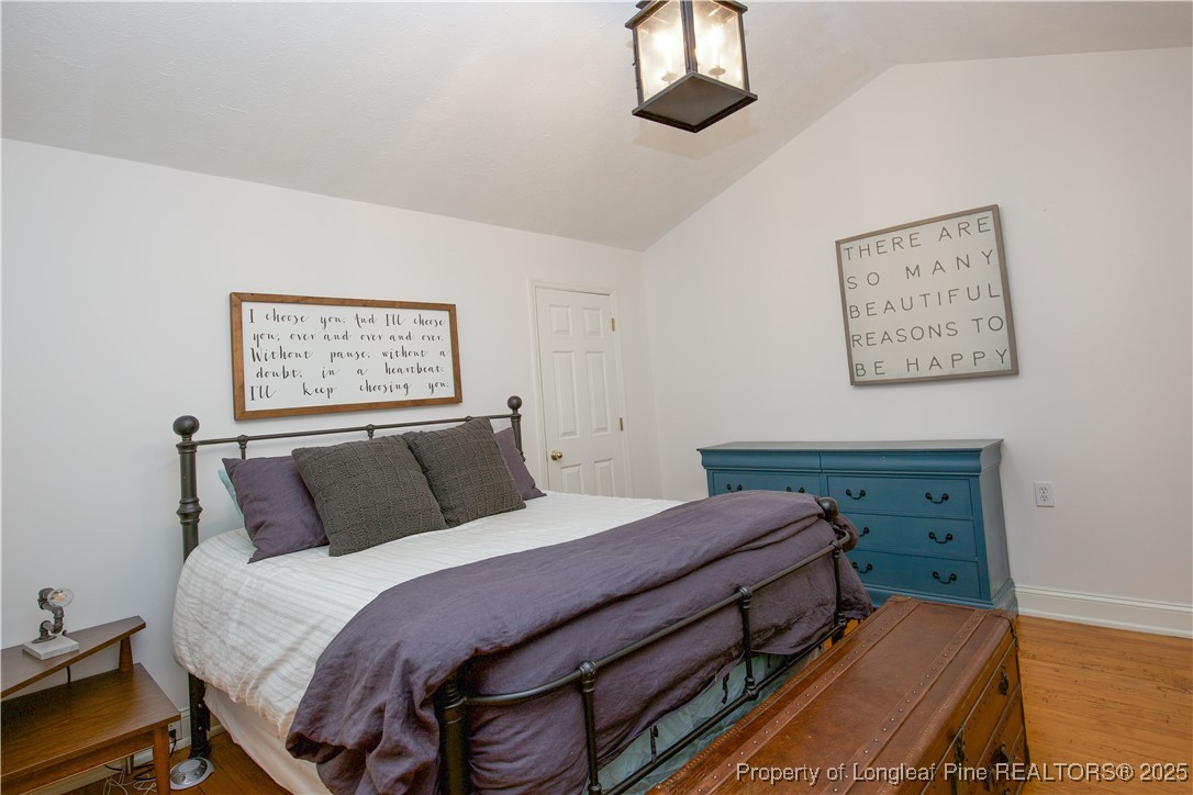 200 Cameron Avenue Vass, NC 28394 - Photo 25 of 50 a bedroom with a bed and a dresser
