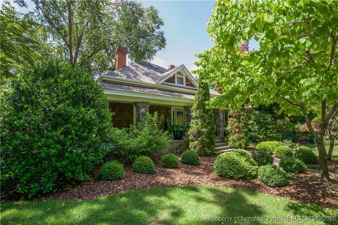 200 Cameron Avenue Vass, NC 28394 - Photo 30 of 50 a front view of a house with a yard