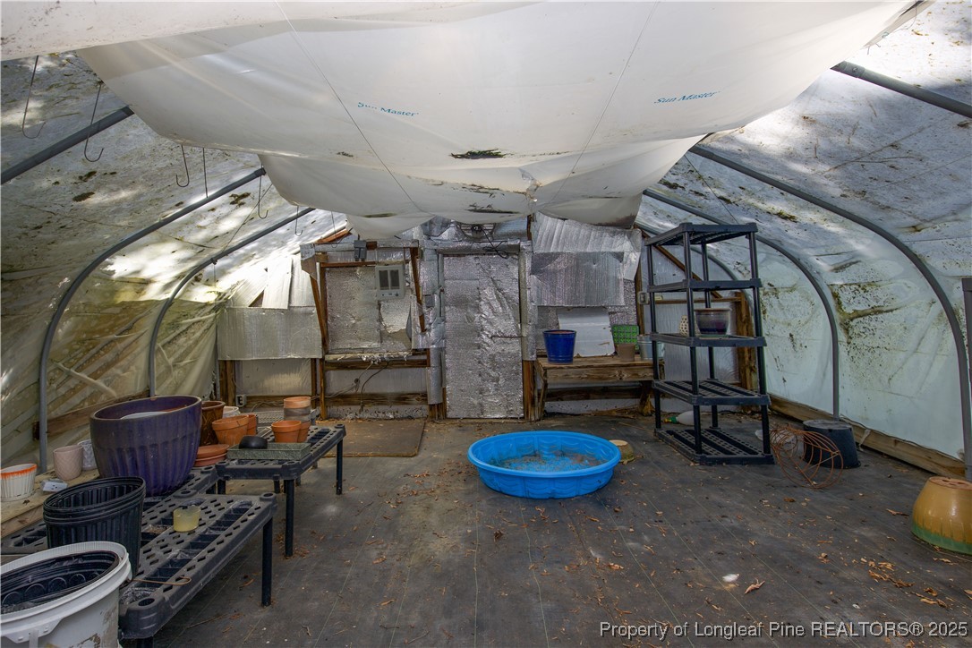 200 Cameron Avenue Vass, NC 28394 - Photo 34 of 50 a view of a room with gym equipment