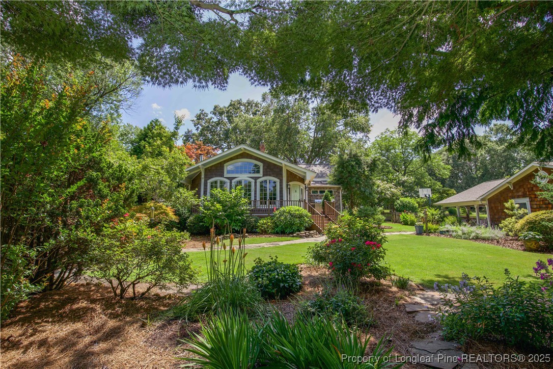 200 Cameron Avenue Vass, NC 28394 - Photo 35 of 50 a front view of a house with a yard