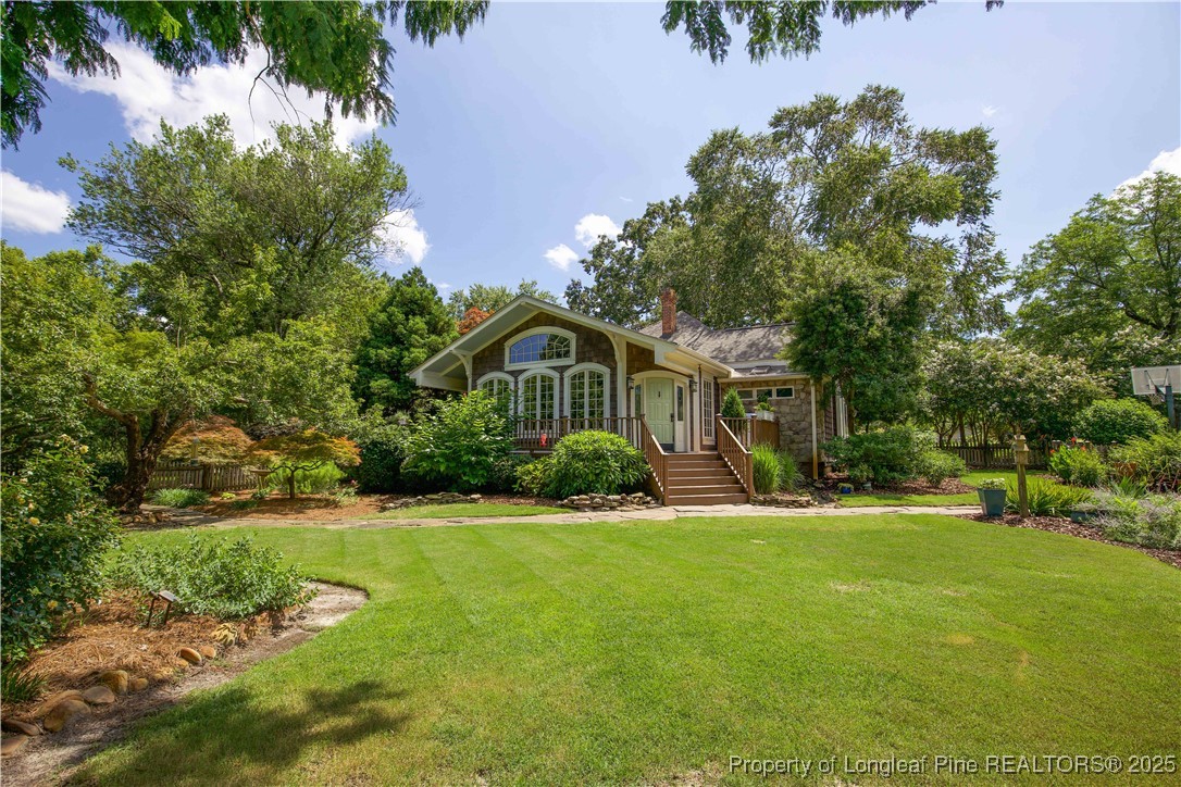 200 Cameron Avenue Vass, NC 28394 - Photo 37 of 50 a front view of a house with a yard