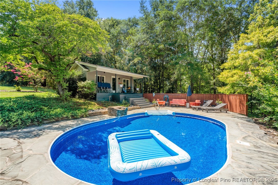 200 Cameron Avenue Vass, NC 28394 - Photo 39 of 50 a view of swimming pool with seating space