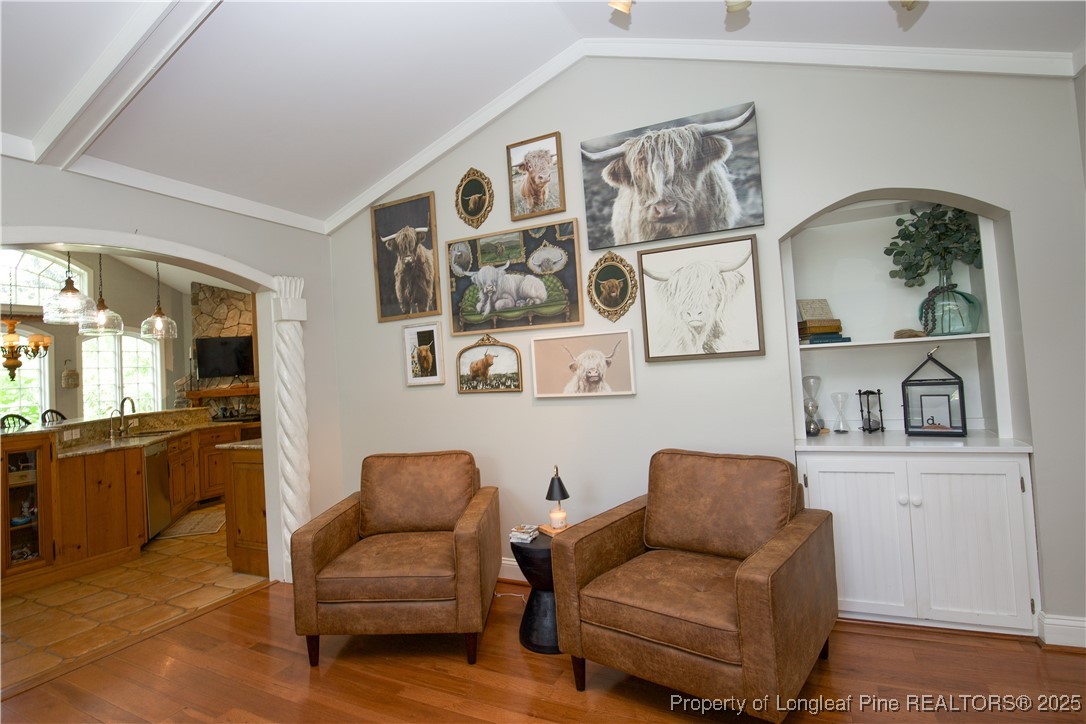 200 Cameron Avenue Vass, NC 28394 - Photo 7 of 50 a living room with furniture and painting on the wall