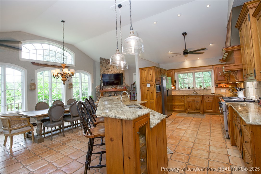 200 Cameron Avenue Vass, NC 28394 - Photo 10 of 50 a view of a kitchen and dining area
