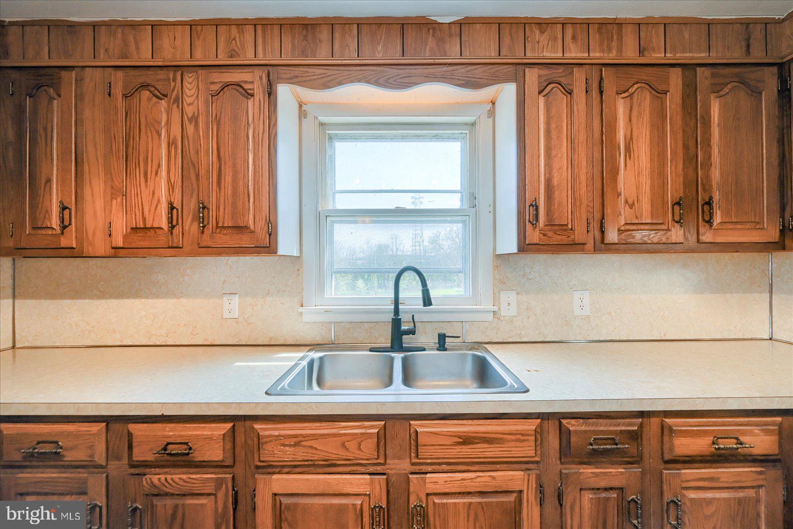 1144 Centennial Road New Oxford, PA 17350 - Photo 15 of 40 a kitchen with stainless steel appliances granite countertop a sink and a cabinets