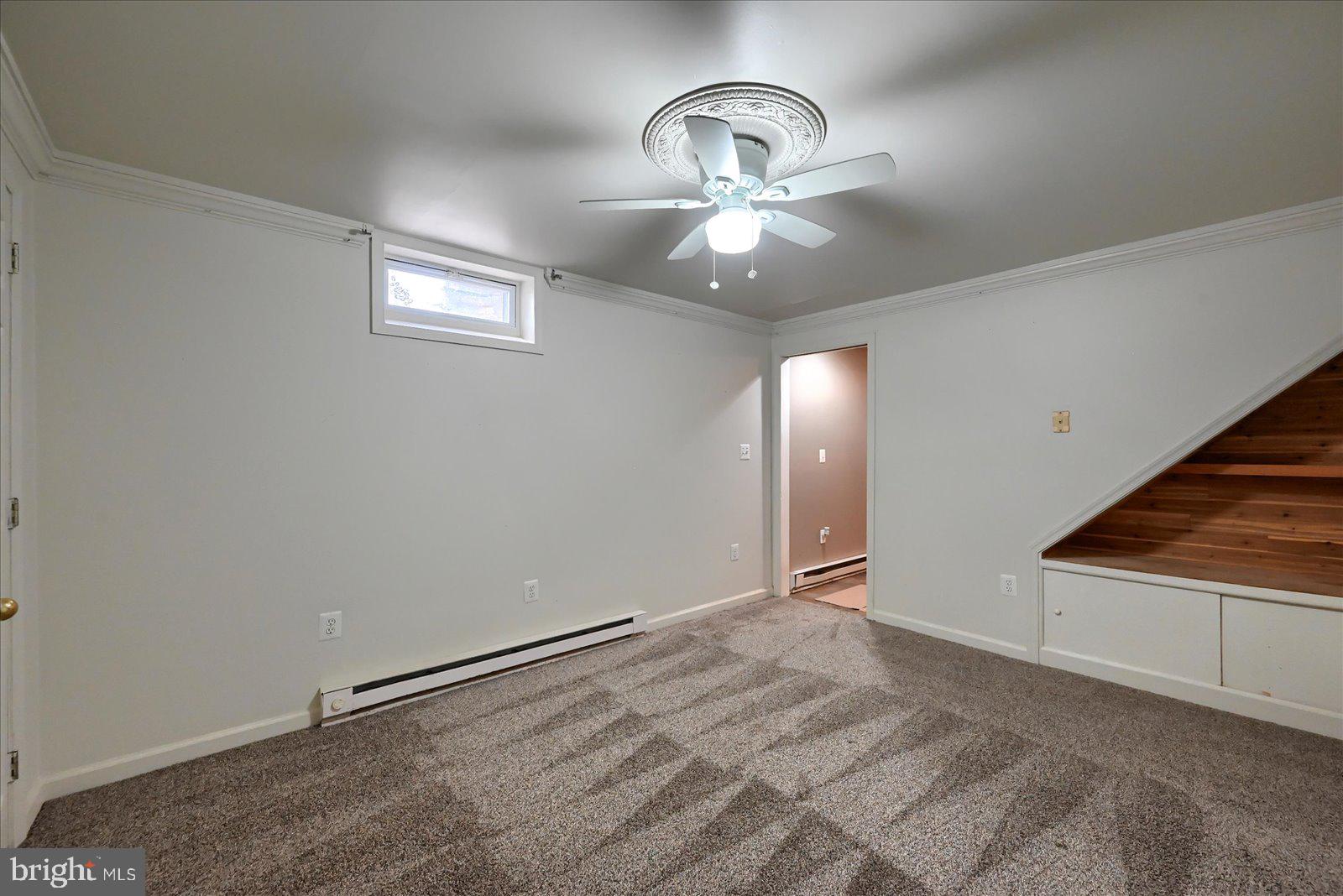 1144 Centennial Road New Oxford, PA 17350 - Photo 24 of 40 an empty room with windows and fan