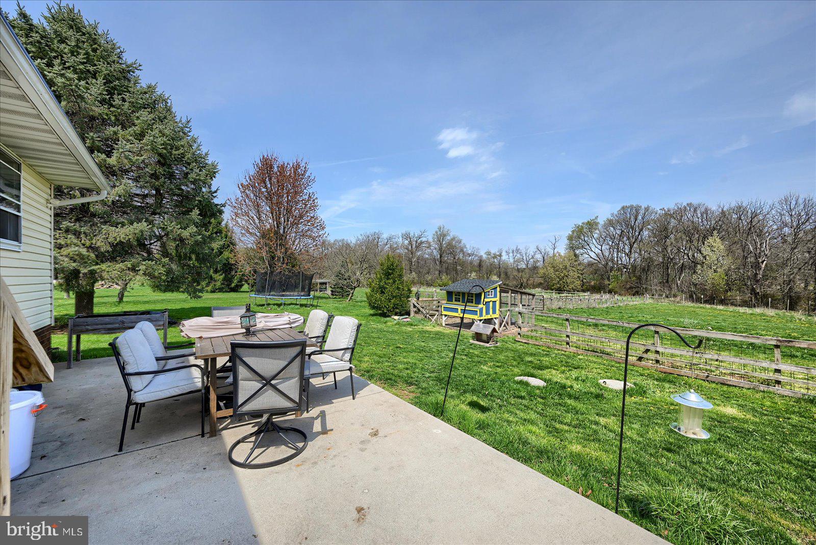 1144 Centennial Road New Oxford, PA 17350 - Photo 29 of 40 a view of a table and chairs in the garden