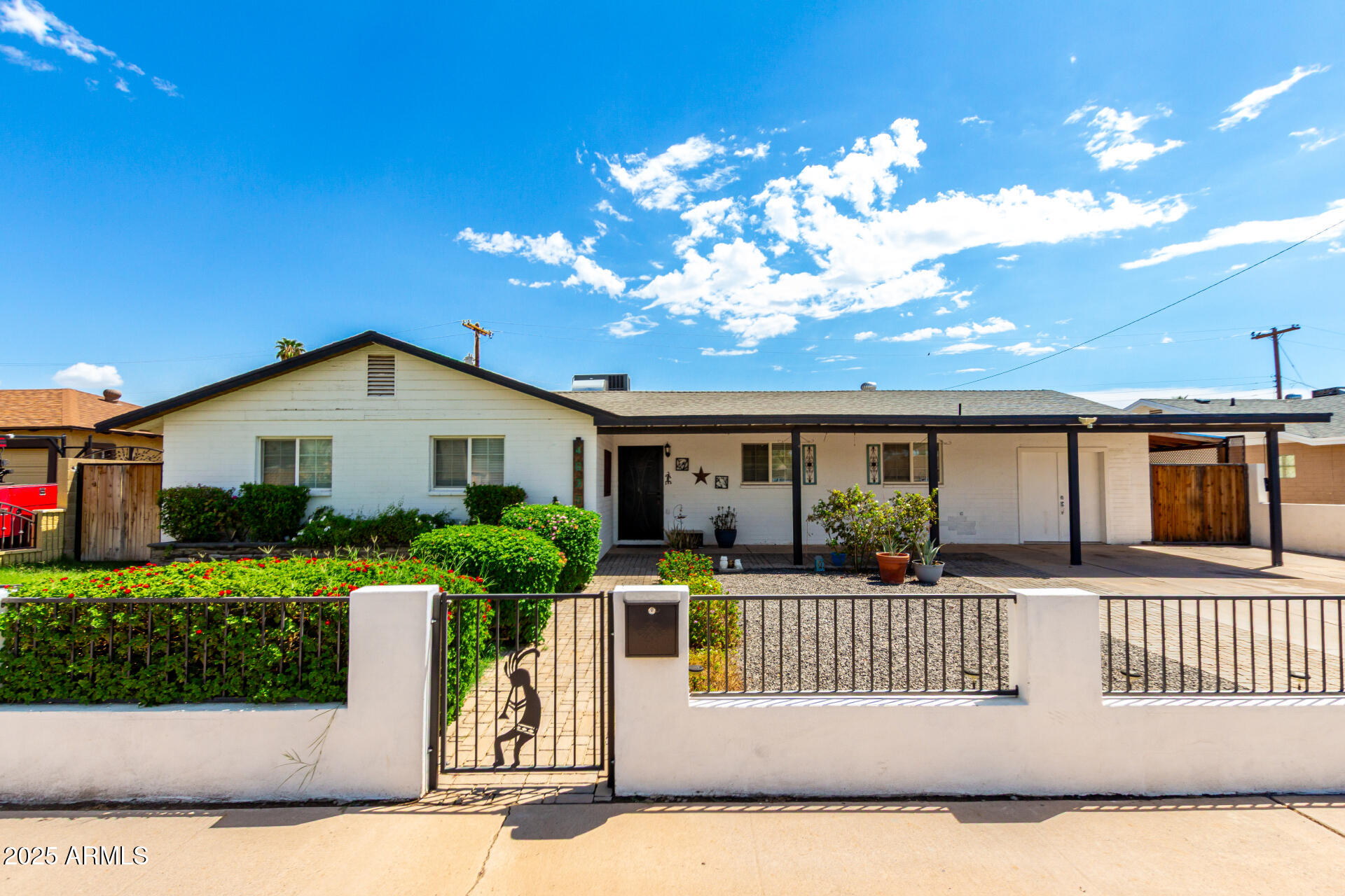 a front view of house with yard and garage