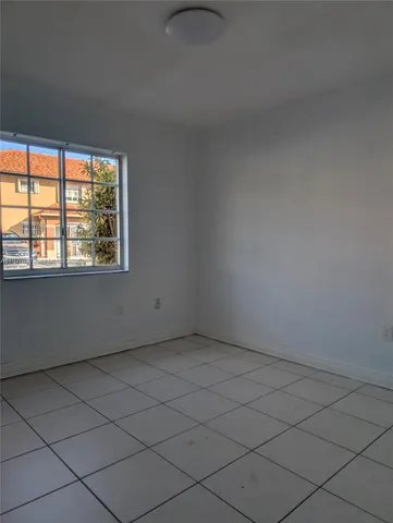 an empty room with a window