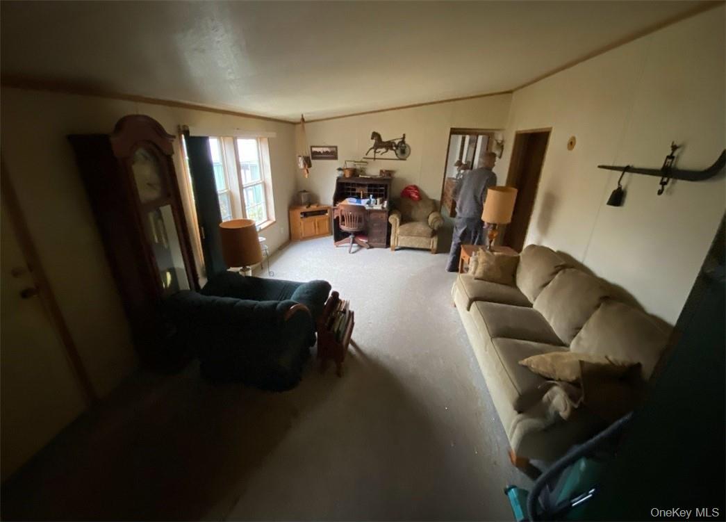 16 Ryan Road Pine Plains, NY 12567 - Photo 12 of 18 a living room with furniture and a flat screen tv