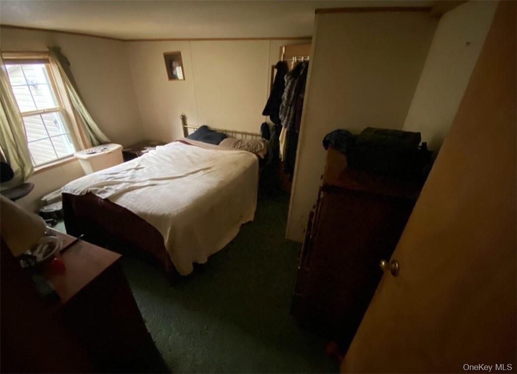 16 Ryan Road Pine Plains, NY 12567 - Photo 14 of 18 a bedroom with a bed and a closet