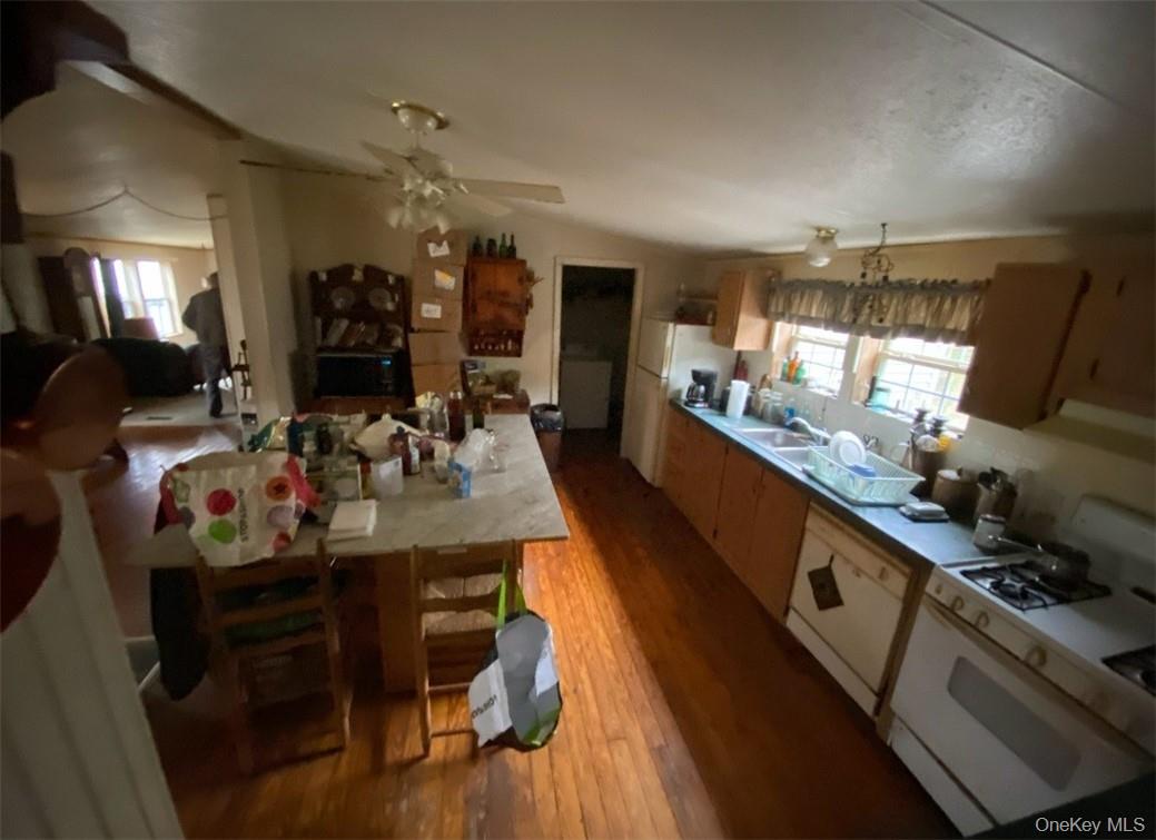 16 Ryan Road Pine Plains, NY 12567 - Photo 9 of 18 a kitchen with sink stove and cabinets