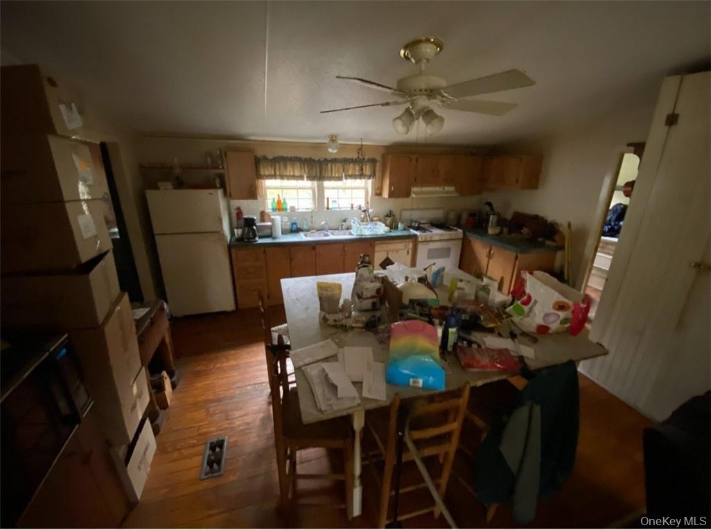 16 Ryan Road Pine Plains, NY 12567 - Photo 10 of 18 a view of a dining room with furniture window and wooden floor
