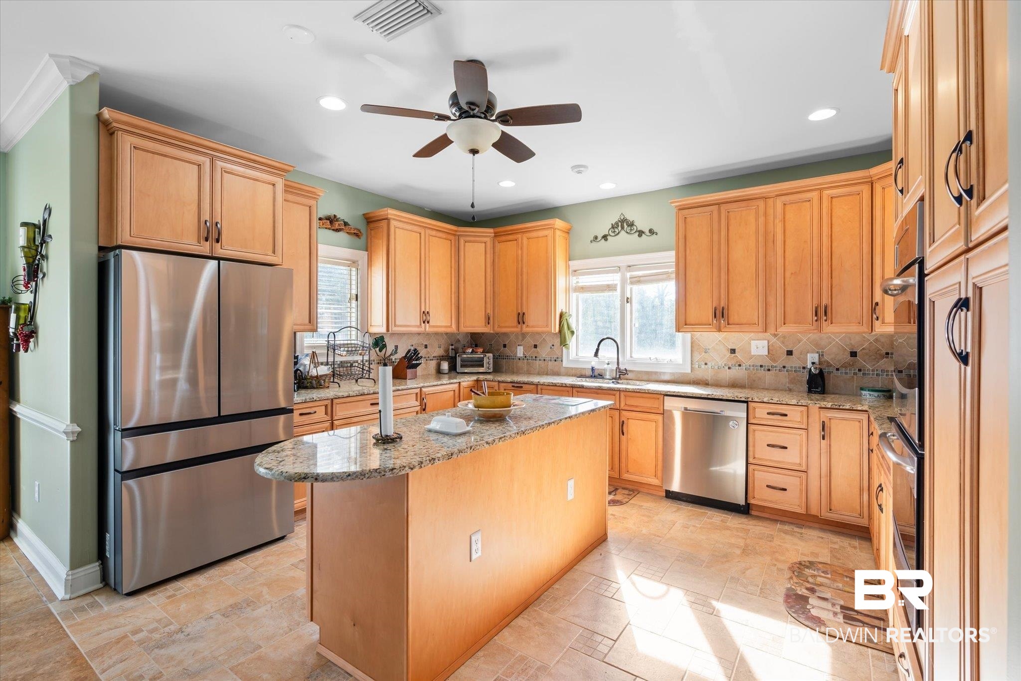 15635 County Road 83 Elberta, AL 36530 - Photo 9 of 54 Kitchen featuring light stone countertops, a center island, stainless steel appliances, and sink